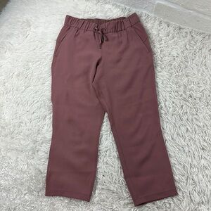 Lululemon On the Fly Crop *Woven 23" Red Dust